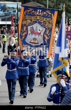 Les membres de l'ordre d'Orange, prendre part à l'assemblée annuelle de l'ordre d'Orange County Grand Boyne Parade dans le centre-ville de Glasgow. Banque D'Images