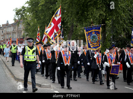 Les membres de l'ordre d'Orange, prendre part à l'assemblée annuelle de l'ordre d'Orange County Grand Boyne Parade dans le centre-ville de Glasgow. Banque D'Images