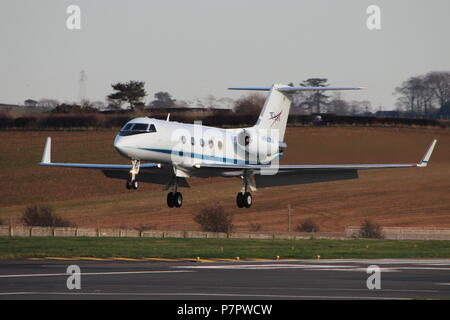 N992NA, un Gulfstream III gérée par la NASA, à travers l'aéroport de Prestwick avec le personnel de la Station spatiale internationale. Banque D'Images