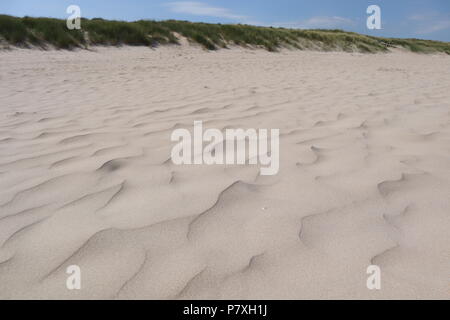 Vaguelettes sur sable Portstewart Strand Banque D'Images