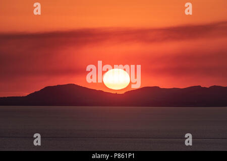 Coucher de soleil sur la péninsule de Llyn Banque D'Images