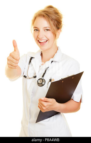 Femme souriante comme une infirmière du service de soins infirmiers tient son pouce vers le haut Banque D'Images