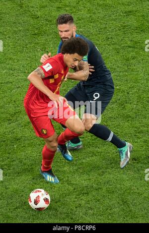 Saint-pétersbourg, Russie. 11 juillet, 2018. Axel WITSEL (gauche, BEL) contre Olivier GIROUD (FRA), action, duels, France (FRA) - Belgique (BEL) 1 : 0, demi-finale, match 61, le 10.07.2018 à Saint-Pétersbourg ; Coupe du Monde de Football 2018 en Russie à partir de la 14.06. - 15.07.2018. © | Conditions de crédit dans le monde entier : dpa/Alamy Live News Banque D'Images