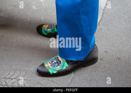 MILAN - JUNE 16: Man with green Goyard bag Jaeger Le coultre Reverso watch  before Marni fashion show, Milan Fashion Week street style on June 16, 2018  Stock Photo - Alamy