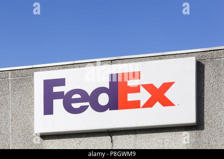 Kolding, Danemark - 28 Février 2016 : FedEx signe sur un mur. FedEx Corporation est une société de services de livraison de courrier mondial Banque D'Images