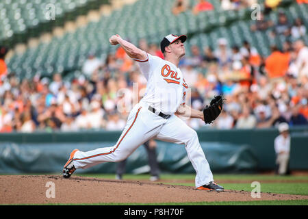 Baltimore Orioles starting pitcher Dylan Bundy reacts after center fielder Adam  Jones hit him with a pie after Bunday threw a one-hit baseball game against  the Seattle Mariners in Baltimore, Tuesday, Aug.