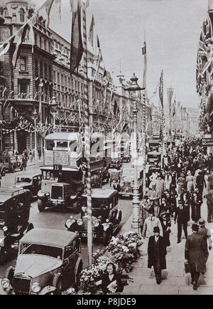 Regent Street à Londres prend un air de fête avant le Jubilé d'argent du roi George V en 1934 du couronnement. Banque D'Images