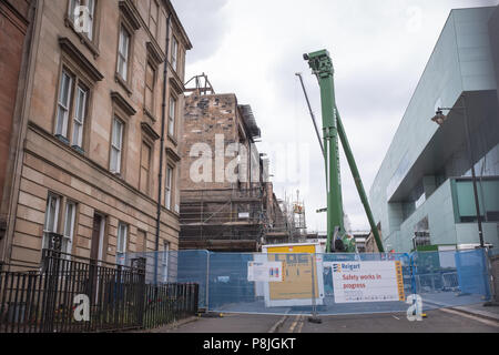 Vue du bâtiment de la Glasgow School of Art endommagé par le feu dans Renfrew Street, Glasgow, alors que les travaux de réparation commencent. Banque D'Images