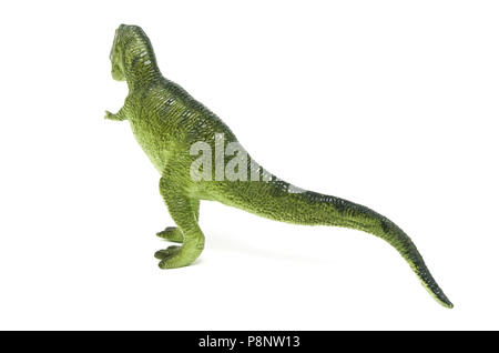 Retour de vert en plastique jouet dinosaure Tyrannosaurus rex, isolé sur un fond blanc. Banque D'Images