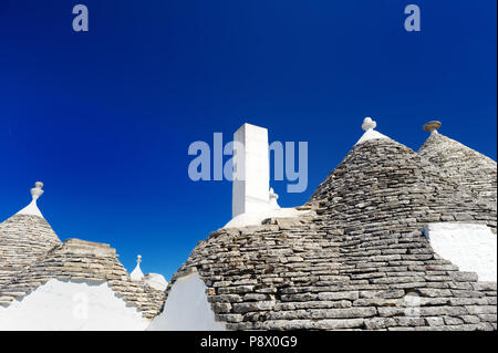 Maisons trulli traditionnels à Alberobello, Italie Banque D'Images