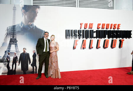 Christopher McQuarrie et épouse Heather McQuarrie participant à la Mission : Impossible Fallout première au BFI Imax, Waterloo, London. Banque D'Images