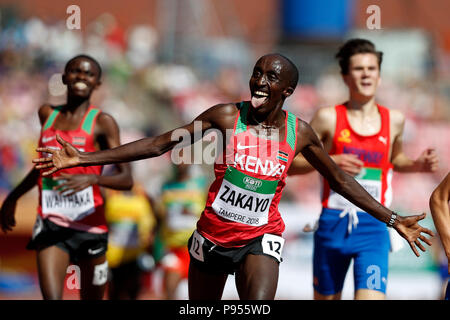 Tampere. 14 juillet, 2018. Edward Zakayo Pingua (avant) du Kenya célèbre après avoir remporté la finale hommes 5000 mètres au Championnat du Monde U20 de l'IAAF à Tampere en Finlande le 14 juillet 2018. Edward Zakayo a remporté la médaille d'or. Credit : Matti Matikainen/Xinhua/Alamy Live News Banque D'Images