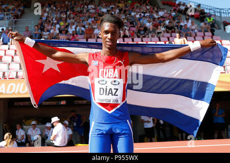 Tampere, Finlande. 14 juillet, 2018. Jordan A. Diaz de Cuba célèbre après le Triple saut Hommes au final les Championnats du Monde U20 Championships à Tampere, Finlande, le 14 juillet 2018. Diaz a remporté la médaille d'or avec 17,15 mètres. Credit : Matti Matikainen/Xinhua/Alamy Live News Banque D'Images