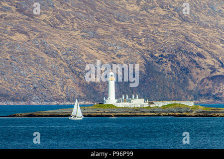 Lismore phare sur le minuscule îlot de Eilean Musdile est une vision commune de l'Oban - Mull ferry ou les navires entrant ou sortant du Sound of Mull. Banque D'Images