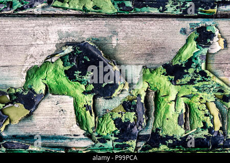 L'écaillage de la peinture sur la texture de la surface de la planche en bois ancien Banque D'Images