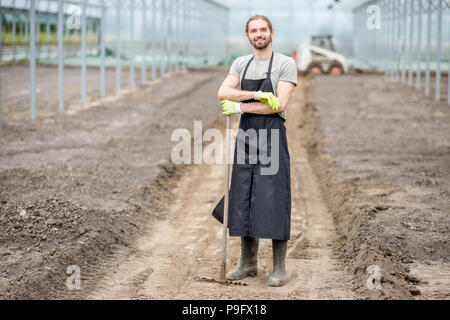 Agriculteur dans la serre Banque D'Images