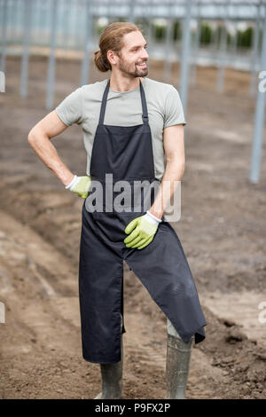 Agriculteur dans la serre Banque D'Images