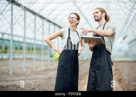 Les agriculteurs à l'impact de la tablette Banque D'Images