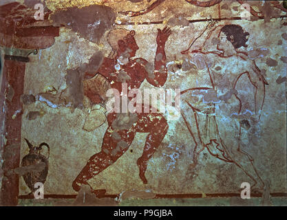 Chambre funéraire de la nécropole de Tarquinia, la peinture murale représentant les deux danseurs. Banque D'Images