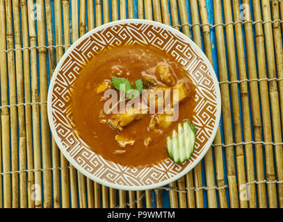 Alleppey curry de poisson - Style Kerala Curry de Poisson épicé qui est légèrement piquant en raison de l'utilisation des matières les mangues ou le tamarin. Banque D'Images