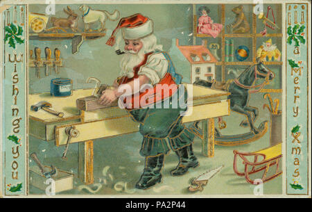 311 Carte postale de Noël avec le Père Noël à manches longues chemise en atelier fabrication de jouets, avec "Je vous souhaite un Joyeux Noël" Banque D'Images