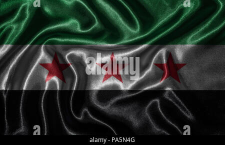 Syrie - Tissu drapeau drapeau de la Syrie, pays de l'arrière-plan et un fond d'Waving Flag par le textile. Banque D'Images