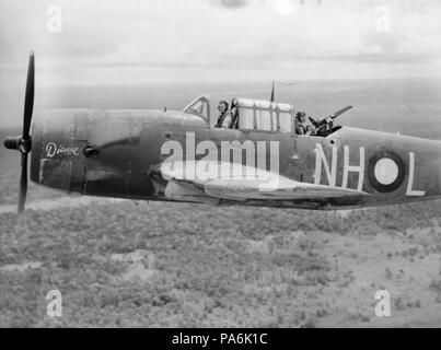 184 Aucun Escadron bombardier en piqué 12 Vengeance en vol près de Merauke en décembre 1943 Banque D'Images