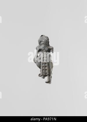 Conduire la figure d'une femme. Culture : le grec, le Laconien. Dimensions : Hauteur : 1 5/16 in. (3,3 cm). Date : fin 7e - début 6e siècle avant J.-C.. Petit figurines votives de plomb durci ont été trouvés en grande quantité, à l'ancienne des sanctuaires de la Laconie ; plus de cent mille, datant du viie siècle avant J.-C. à l'époque classique, ont été dédiés à la déesse Artémis Orthia à Sparte. Musée : Metropolitan Museum of Art, New York, USA. Banque D'Images