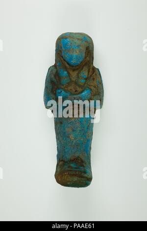 Henettawy Shabti de travailleur (C), fille d'Isetemkheb. Dimensions : h. 11.7 × w. 4,7 × d. 3,7 cm (4 5/8 x 1 7/8 x 1 7/16 in.). Dynastie DYNASTIE : 21. Date : ca. 990-970 av. J.-C.. Musée : Metropolitan Museum of Art, New York, USA. Banque D'Images