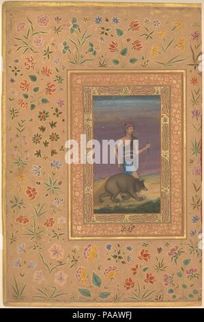 'Dervish conduisant un ours', Folio du Shah Jahan Album. Artiste : Peinture de Govardhan actif (ca. 1596-1645). Calligraphe : Mir 'Ali (Haravi d. ca. 1550). Dimensions : H. 15 5/16 in. (38,9 cm) 10 W. 1/16 in. (25,6 cm). Date : recto : ca. 1630-40 ; Verso : ca. 1530-40. Cette peinture d'un derviche reflète l'intérêt de Mughal dans de saints hommes. L'Dara-Shikoh, Shah Jahan, le fils aîné, est devenu un étudiant sérieux de ces croyances spirituelles et cette peinture était vraisemblablement exécuté sous son patronage. Un derviche portant une fourrure brune couvrant, boucles d'oreilles, bracelets de cheville, une tête d'un ours brun foncé Banque D'Images