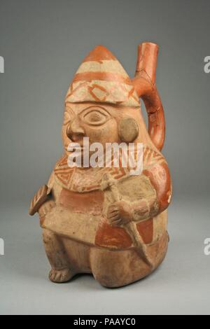 Tuyère d'étrier avec bouteille à genoux Warrior. Culture : moche. Dimensions : hors tout : 9 x 5 5/8 in. (22,86 x 14,3 cm) Autres : 5 5/8 in. (14,3 cm). Date : 1er-4e siècle. Musée : Metropolitan Museum of Art, New York, USA. Banque D'Images