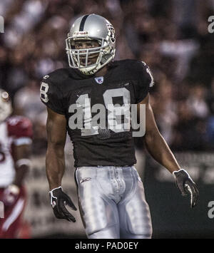 Oakland, Californie, USA. Août 26, 2005. Oakland Raiders le receveur Randy Moss (18) le vendredi, 26 août 2005 à Oakland, Californie. Les Cardinaux défait les Raiders 17-16 dans un match pré-saison. Crédit : Al Golub/ZUMA/Alamy Fil Live News Banque D'Images