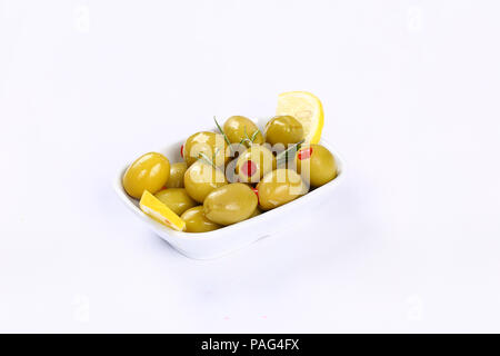 Olives farcies poivrons rouge vert Banque D'Images