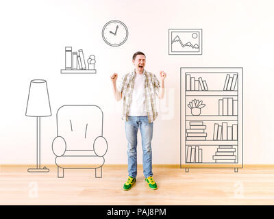 Photo de crier avec jeune homme mur peint sur l'étalage, photo, horloge, fauteuil, lampe de plancher Banque D'Images