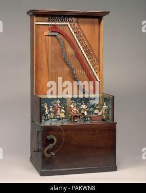 Baril Piano. Culture : L'Américain. Dimensions : H. 92,7 cm Total (36 1/2 in.), W. 43,5 cm (17 1/8 in.), L. de chaîne la plus longue de 69,8 cm (27 1/2 in.), L. de chaîne plus courte de 11,5 cm (4 1/2 in.). Bouilloire : George Hicks (britannique, né en Angleterre 1818-1863 Brooklyn, New York). Date : ca. 1860. Lorsque la manivelle est tournée, les broches sur un cylindre rotatif engager cette grève marteaux les cordes, la lecture d'une de dix morceaux, y compris 'Yankee Doodle.' En même temps, une cloche sonne et le déplacer chiffres articulés dans le temps de la musique. L'une figure dans un creux, les dépôts des crédits. Illustré avec l'avant du panneau de protection de chaîne supprimée. Museu Banque D'Images