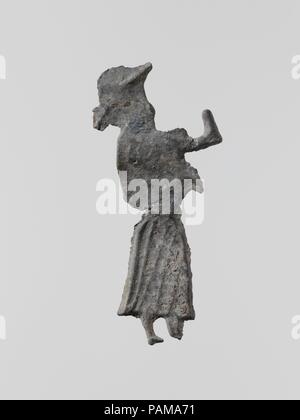 Conduire la figure d'une femme. Culture : le grec, le Laconien. Dimensions : Hauteur : 2 1/16 in. (5,2 cm). Date : fin 7e-6e siècle avant J.-C.. Petit figurines votives de plomb durci ont été trouvés en grande quantité, à l'ancienne des sanctuaires de la Laconie ; plus de cent mille, datant du viie siècle avant J.-C. à l'époque classique, ont été dédiés à la déesse Artémis Orthia à Sparte. Musée : Metropolitan Museum of Art, New York, USA. Banque D'Images