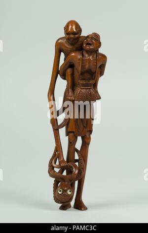 Netsuke de deux hommes et d'une pieuvre. Culture : le Japon. Dimensions : H. 5 7/8 in. (14,9 cm). Date : du 19e siècle. Musée : Metropolitan Museum of Art, New York, USA. Banque D'Images