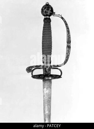 Smallsword couilles et la lame. Culture : revêtement, Japonais, peut-être à Dejima ; limbe, européenne. Dimensions : Hilt (a) ; L. environ 7 in. (17,8 cm) ; W. environ 4 in. (10,2 cm) ; WT. 5.3 oz. (150,3 g) ; la lame (B) ; L. 40 1/8 in. (101,9 cm) ; WT. 5.5 oz. (155,9 g). Date : ca. 1730. Garnies d'épée de la mode européenne faite de shakudo, un alliage de cuivre et d'or à l'patiné couleur bleu-noir qui a été utilisé au Japon pour les petits objets de décoration tels que les fixations de l'épée, étaient probablement fabriqués pour la Dutch East India Company à leur poste de traite sur l'île japonaise de Deshima. Les éléments de fond comme celles-ci étaient le Banque D'Images