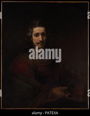 Homme avec une loupe. Artiste : Rembrandt Rembrandt (van Rijn) (Néerlandais, Leyde 1606-1669 Amsterdam). Dimensions : 36 x 29 1/4 in. (91,4 x 74,3 cm). Date : début des années 1660. Le costume et posent de l'homme dans cette magnifique œuvre tardive de Rembrandt ont été inspirés par les célèbres Raphaël portrait de Baldassare Castiglione (Musée du Louvre, Paris), qui a étudié Rembrandt lorsqu'il est apparu aux enchères à Amsterdam en 1639. L'homme qui a dirigé la vente aux enchères a Pieter Haringh (1609-1685), qui est très probablement le sujet ici ; ses traits sont connus à partir d'une gravure de Rembrandt de 1655. La loupe n'h Banque D'Images