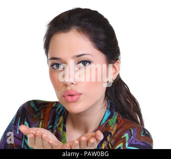 Blow kiss, young caucasian female brunette model, isolé sur fond blanc Banque D'Images