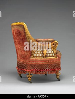 Fauteuil. Culture : L'Américain. Dimensions : 33 x 27 x 28 1/2 in. (85,1 x 68,6 x 71,1 cm). Bouilloire : Herter Brothers (allemand, actif à New York, 1864-1906). Date : 1881-1882. William H. Vanderbilt, fils de Cornelius Vanderbilt' 'Commodore, hérité d'une grande fortune et une lucrative entreprise de transport, dont il a étendu de façon exponentielle, de devenir l'un des hommes les plus riches de l'Amérique. En 1879, pour marquer son statut social et économique élevé, il construit un hôtel particulier qui couvre tout un pâté de maisons de la Cinquième Avenue, entre les 51e et 52e Rues. Il a commissionné Herter Brothers, l'un des meilleurs cabin Banque D'Images