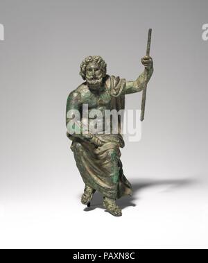 Statuette en bronze de Jupiter Capitolinus. Culture : Roman. Dimensions : d'autres : 4 11/16 x 2 3/8 x 2 in. (11,9 x 6 x 5,1 cm). Date : 1er et 2e siècle de notre ère. Jupiter trône dans toute sa majesté, tenant un foudre de la main droite et un long sceptre dans sa main gauche. Musée : Metropolitan Museum of Art, New York, USA. Banque D'Images