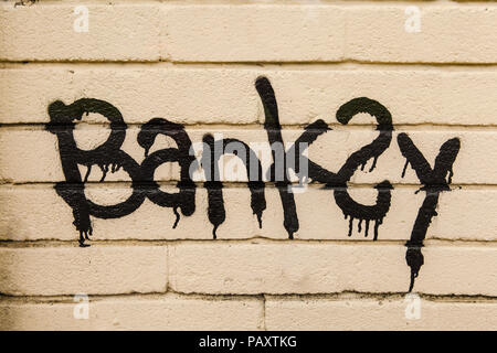 Bansky Art sur un mur de classe à l'école primaire de la ferme du Pont, Bristol Banque D'Images