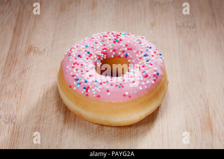 Délicieux donut sur bois unique Banque D'Images