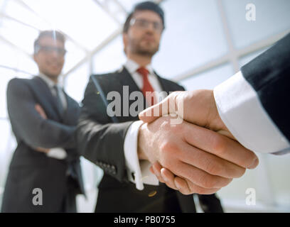 Fond d'affaires.business handshake Banque D'Images