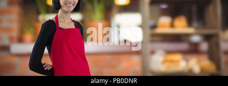 Image composite de smiling waitress standing against white background Banque D'Images