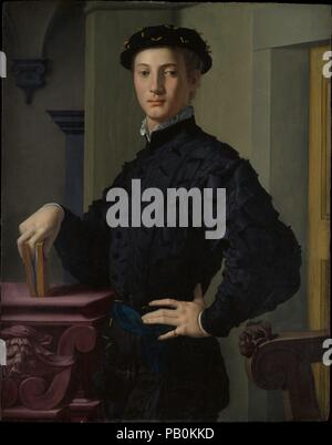 Portrait d'un jeune homme. Artiste : Bronzino (Agnolo di Cosimo di Mariano) (Italien, Monticelli 1503-1572 Florence). Dimensions : 37 5/8 x 29 1/2 in. (95,6 x 74,9 cm). Date : années 1530. La gardienne de ce portrait d'arrêt reste inconnu, mais il a fait partie de Bronzino's cercle d amis littéraires à Florence et contient probablement un livre de poésie. L'artiste a lui-même un poète, enchantant autant de la beauté de la langue, comme il l'a fait à l'esprit fantaisiste et détails de ses peintures. Ici, les téléspectateurs auraient apprécié les têtes grotesques sculptées sur la table et chaise, et le masque, presque cachée Banque D'Images