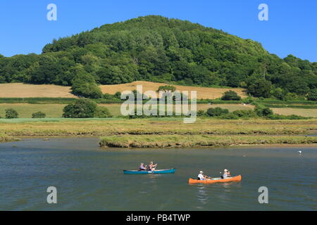 Les kayakistes sur la rivière Ax'estuaire près de la ville de Seaton dans l'est du Devon Banque D'Images