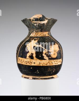 Oinochoe en terre cuite : chous (jug). Culture : le grec, le grenier. Dimensions : H. avec poignée 4 3/4 in. (12,1 cm). Date : ca. 440-420 av. J.-C.. Garçon pousser un enfant dans un panier à l'Anthesteria, le festival du vin nouveau qui a eu lieu à l'automne, les enfants ont participé. Les petites choes faite de leur utilisation sont souvent décorées avec des jeux et jouets. Musée : Metropolitan Museum of Art, New York, USA. Banque D'Images