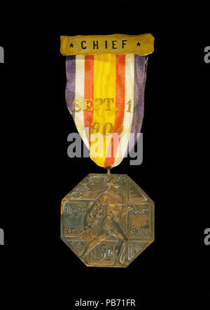 1127 l'insigne officiel porté lors d'événements officiels des Jeux olympiques le 1 septembre 1904 à Saint Louis, Missouri Banque D'Images